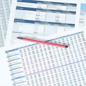 pen over financial reports